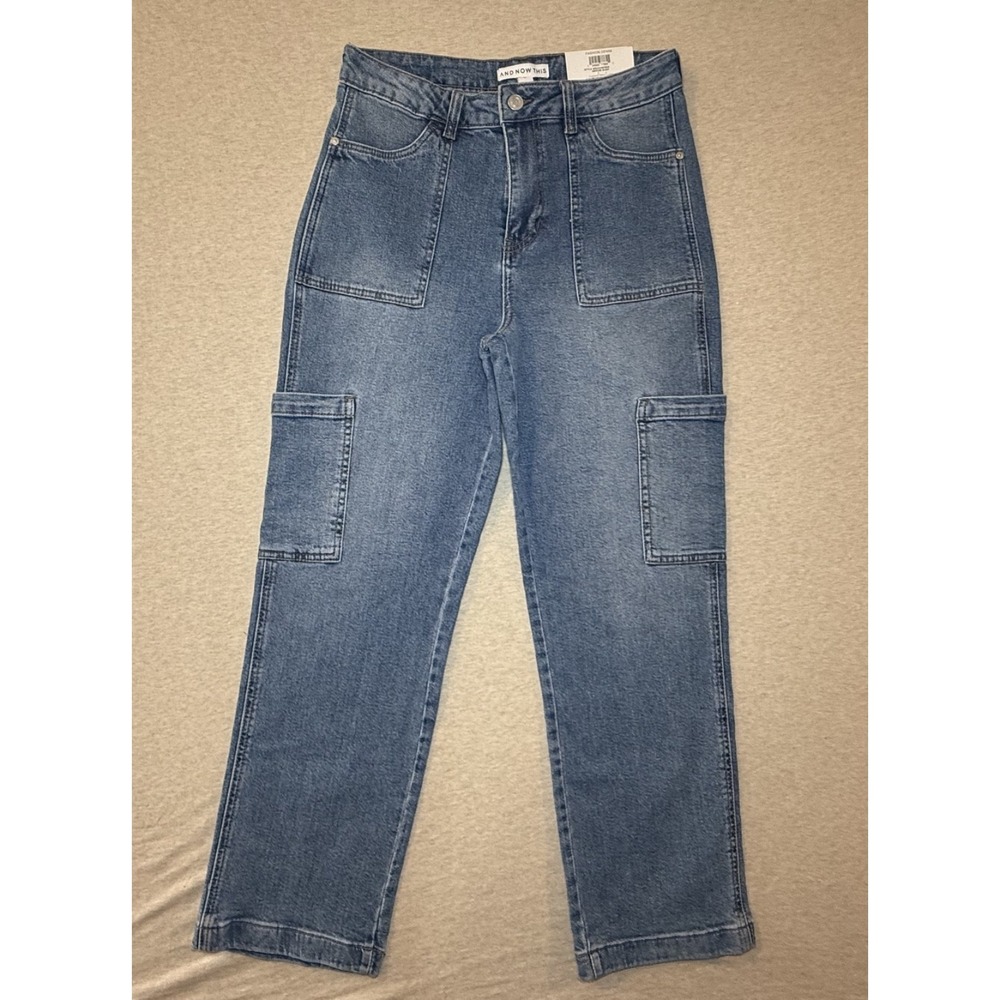 And Now This. size 29. flare cut Blue Jeans. Multiple Pocket design.